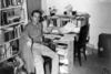 1950's - Ralph D. Winter seated at messy desk